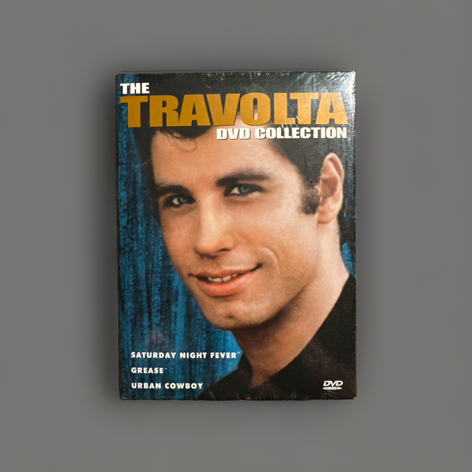 Travolta DVD Collection (3-Disc Set) Grease/Urban Cowboy/Saturday Night Fever.